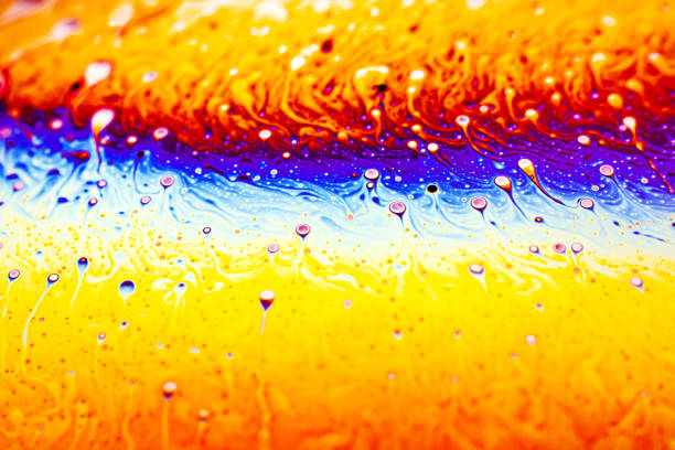 istock Beautiful psychedelic abstraction formed by light on the surface of a soap bubble 1259048542