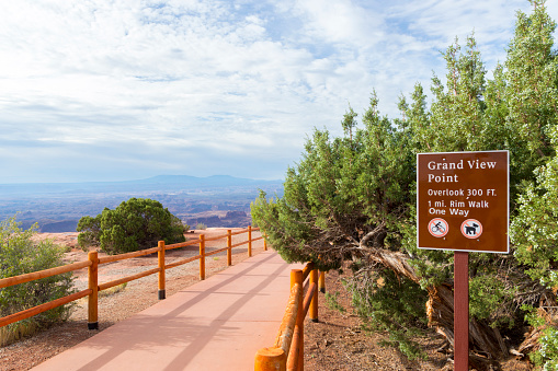 July 24, 2020 - Canyonlands National Park, USA: This photo shows the trailhead and sign for the Grand View Point Overlook hike in Canyonlands National Park.  This shot was taken in the morning.
