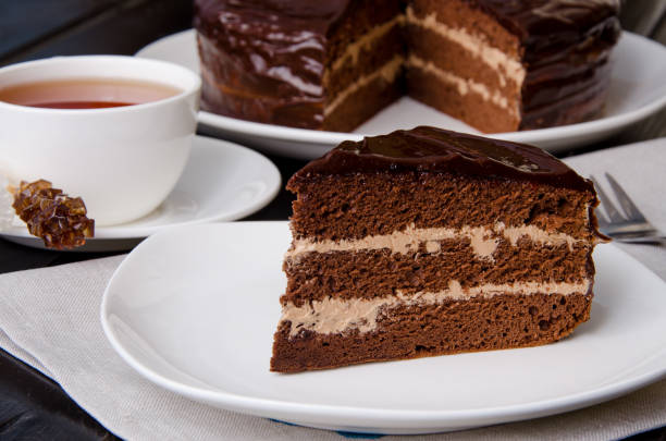 istock Chocolate layer cake with butter cream. Traditional cake Prague. Russian cuisine 1259070840