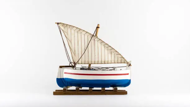 Photo of Toy sailing blue boat