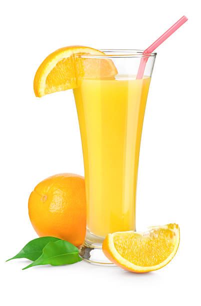 succo d'arancia in un bicchiere - isolated on white orange juice ripe leaf foto e immagini stock
