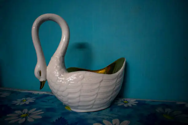 swan showpiece made of porcelain