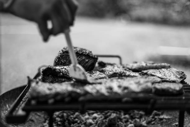 istock barbeque meat preparation in a summer day 1259116809