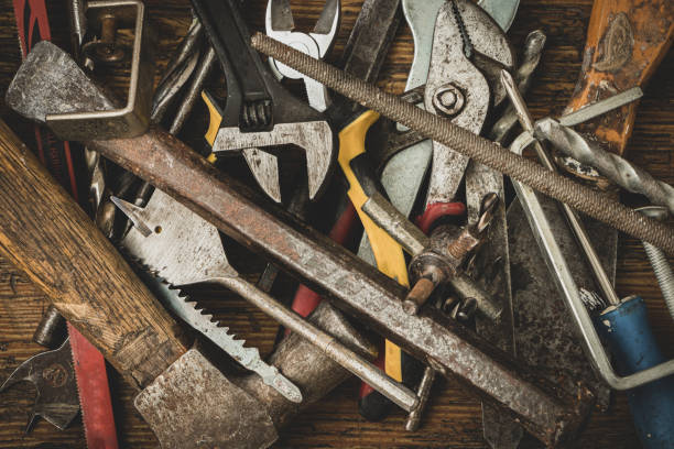 istock Group of old tools for home repair on old wooden table 1259120045