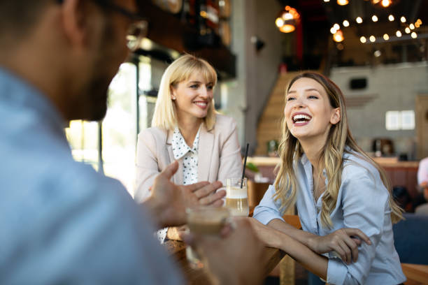 istock Business colleagues having conversation during coffee break 1259122348