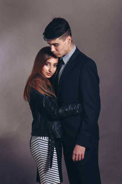 istock Portrait of a hugging couple 1259123995