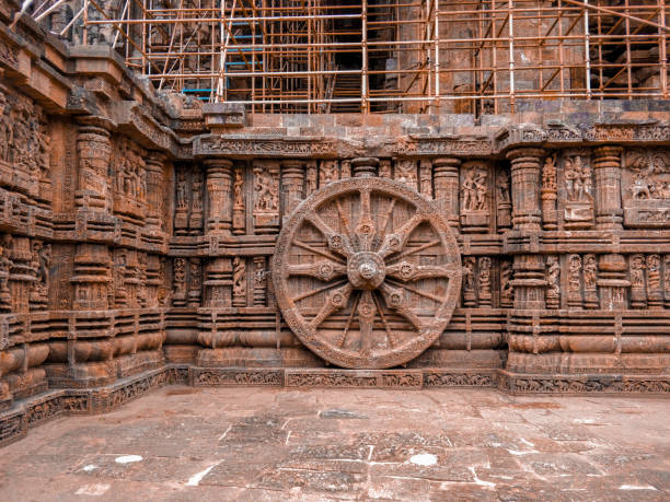 View of the chariot wheel at the Konark Sun Temple in Odisha, India View of the chariot wheel at the Konark Sun Temple in Odisha, India chariot wheel at konark sun temple india stock pictures, royalty-free photos & images