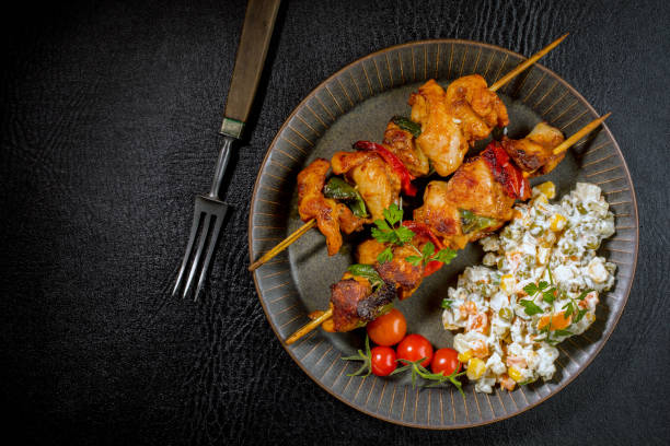 istock Kebab - grilled meat and vegetables salad. 1259136306
