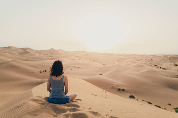 istock Woman enjoys the desert view 1259138926
