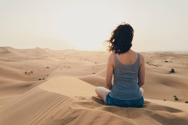 istock Woman enjoys the desert view 1259138965