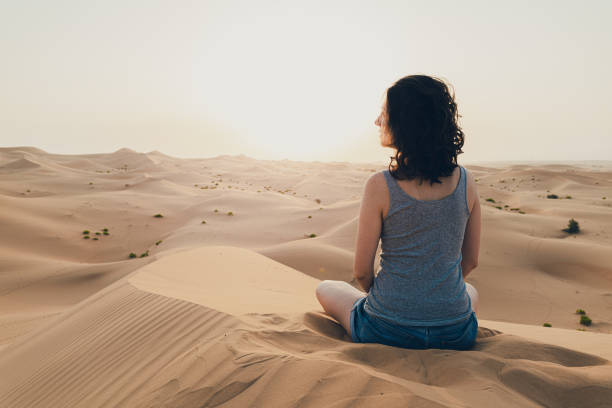 istock Woman enjoys the desert view 1259139111