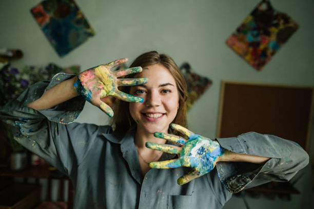 istock Young woman have fun at art home studio 1259148463