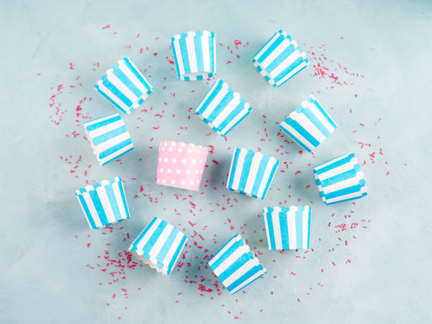 istock Striped blue paper cases for baking with one pink 1259149587