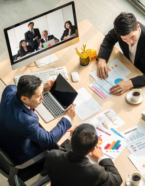 istock Video call group business people meeting on virtual workplace or remote office 1259149750