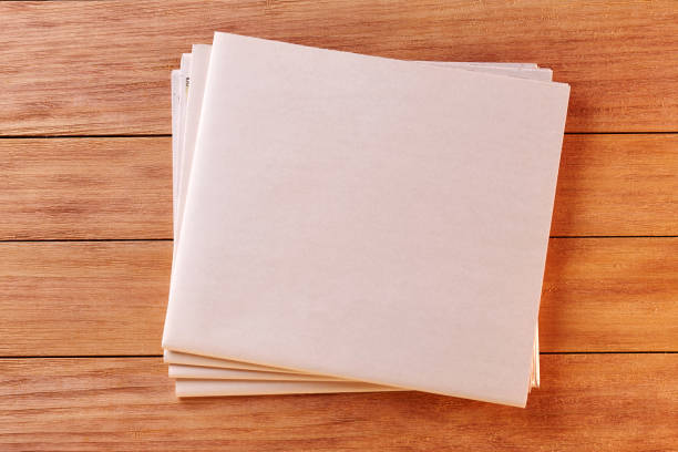 istock Blank Newspaper with empty Space for Text or Image on Wooden Background. 1259151033