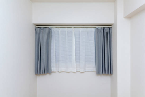 Inside of apartment house in Japan, curtain opened Inside of apartment house in Japan. Bedroom, curtain opened. japan small apartment stock pictures, royalty-free photos & images