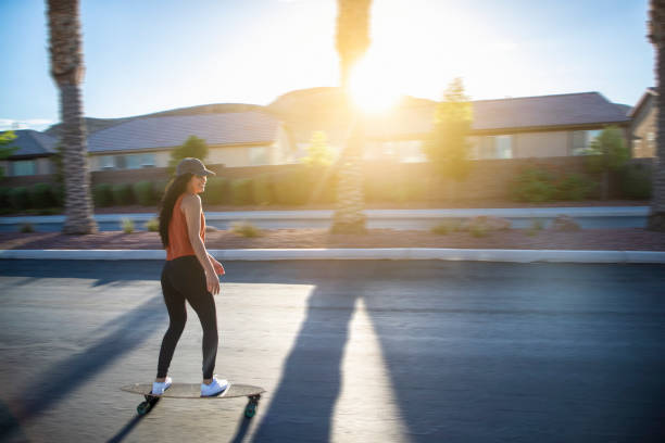 istock Skateboarding Girl 1259159980