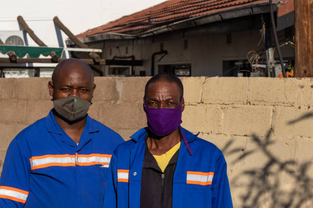 istock portrait of two African workers 1259161808