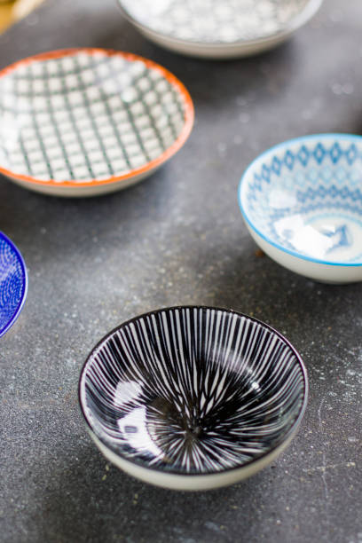 istock Colorful bowls on the black background, studio shoot 1259177705
