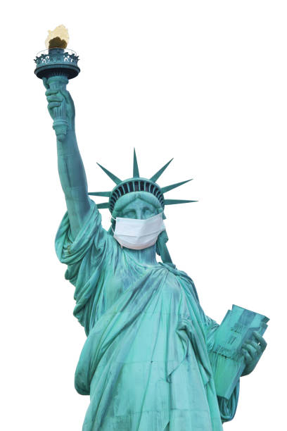 保護フェイスマスク付きの自由の女神。垂直 - crown liberty statue ストックフォトと画像