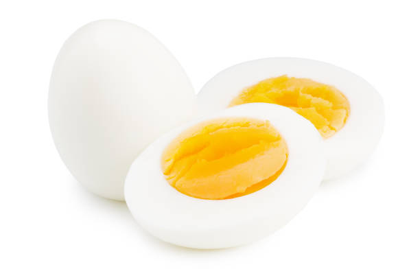 istock Single whole boiled egg with halved egg isolated on a white background 1259185597