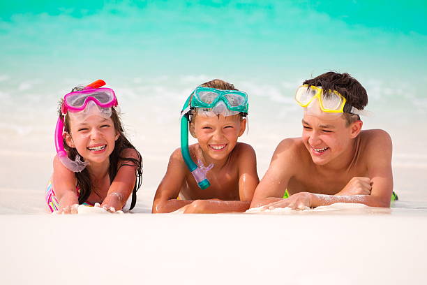 istock Happy children on beach 125922153