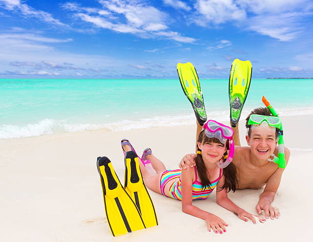 istock Children on beach with snorkel 125922405
