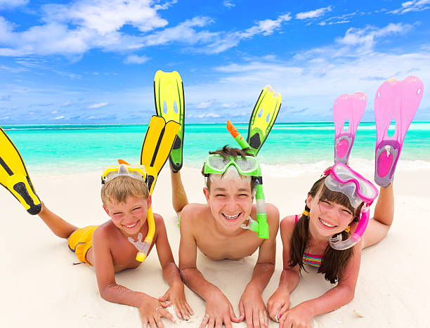 istock Children with snorkels by sea 125922420