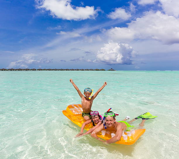 istock Children on air mattress 125922488