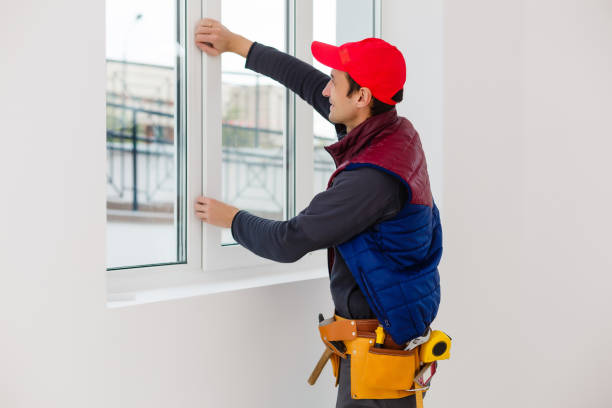 istock bearded adult repairman fixing window 1259225097