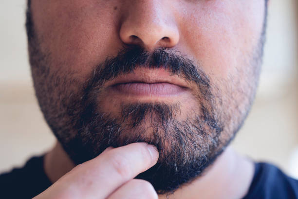 istock the young man is getting older now and his beard is white 1259225123