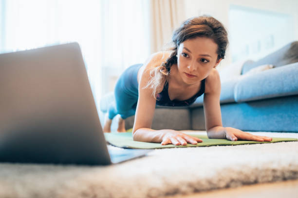 istock Sporty woman doing plank 1259225135