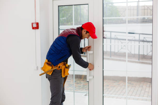 istock bearded adult repairman fixing window 1259226205