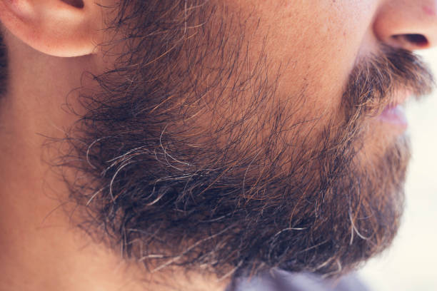 istock the young man is getting older now and his beard is white 1259226721