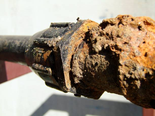 istock Connection of metal and plastic pipes 1259242966