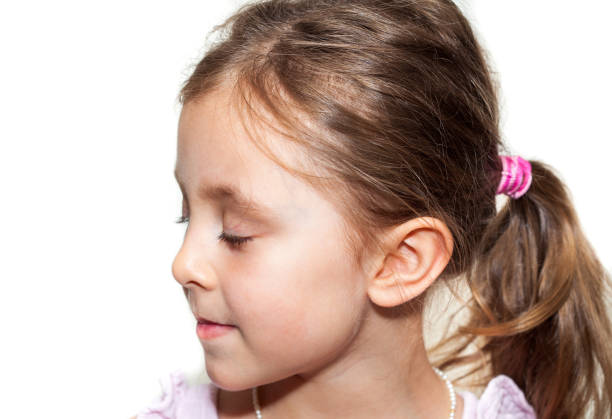 istock Girl with the pearl necklace profile 1259252414