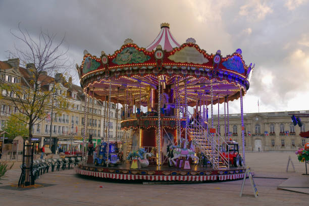 istock evening autumn carousel on the square 1259263005