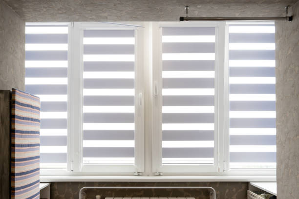 istock Windows with open modern horizontal blinds indoors, closeup 1259263526