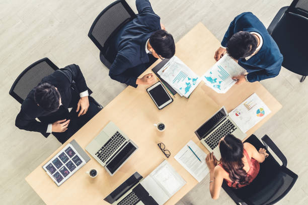 istock Business people group meeting shot from top view 1259275034