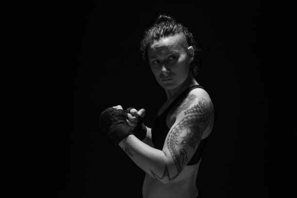 istock Young fighter with fists up 1259277370