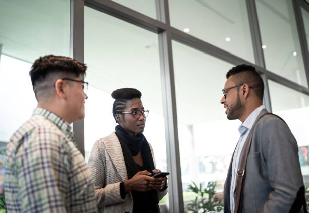istock Group of business people having a conversation 1259323154