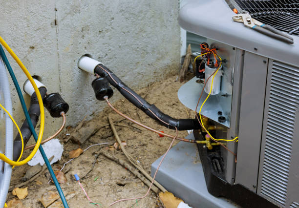 istock Air conditioning system assembled on performing preventive maintenance on air conditioning condenser unit. 1259354221