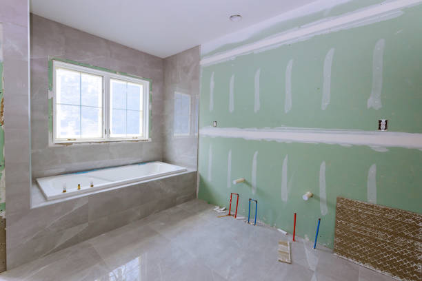 istock Under construction new bathtub remodeling a home bathroom, plumbing pipe for new sinks 1259354226