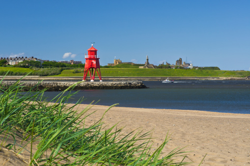 Herd Groyne at South Shields at the mouth of the River Tyne looking toward Tynemouth Priory