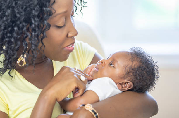 istock Mother and newborn baby 1259355768