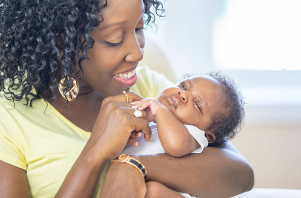 istock Mother and newborn baby 1259355769