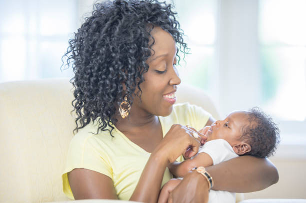 istock Mother and newborn baby 1259356150