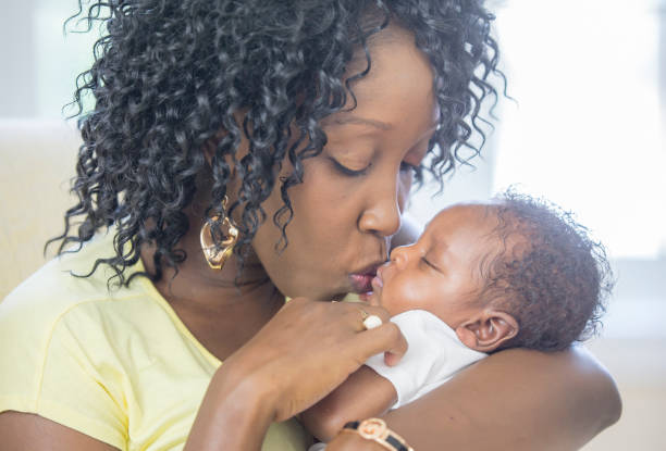 istock Mother and newborn baby 1259356275