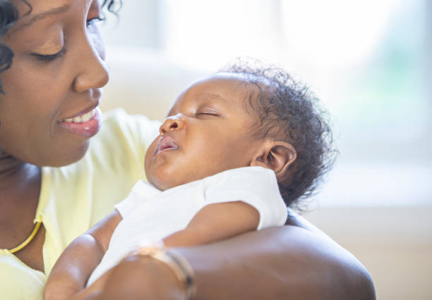 istock Mother and newborn baby 1259356278
