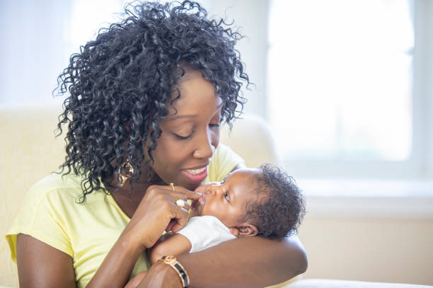 istock Mother and newborn baby 1259356279